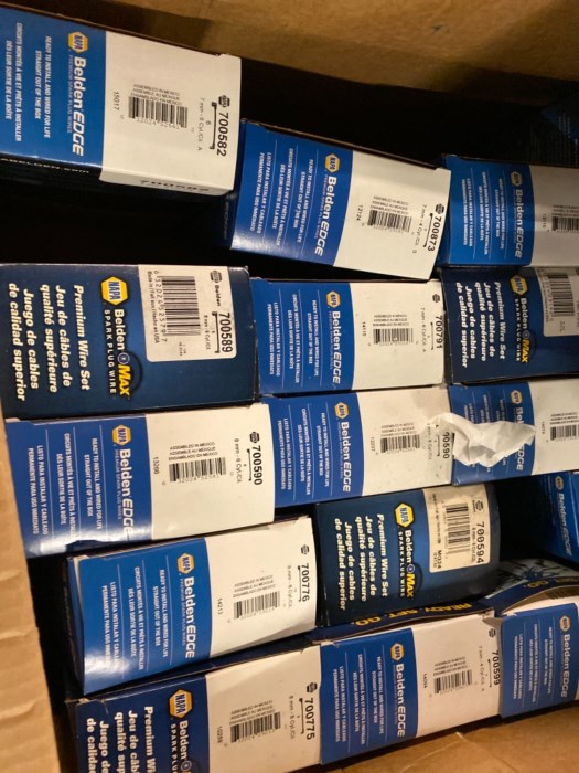 Abandoned Unused Napa Auto Parts, pallet filled with NAPA Spark Plugs