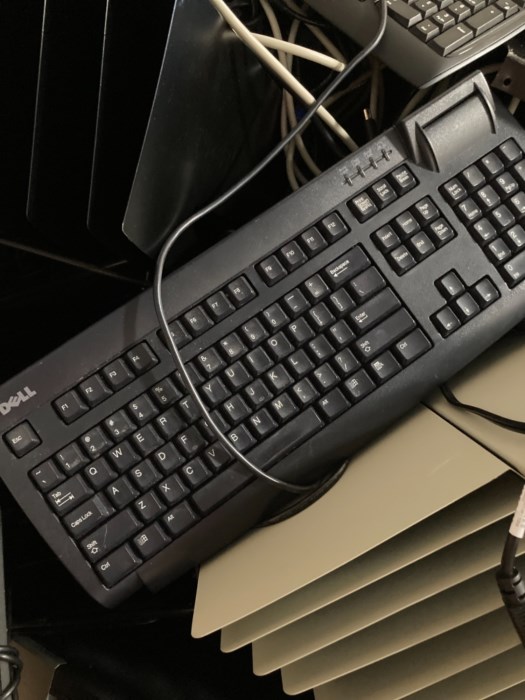 Box of Keyboards, Cords, Paper Holders, Speakers, Monitor Stands for sale