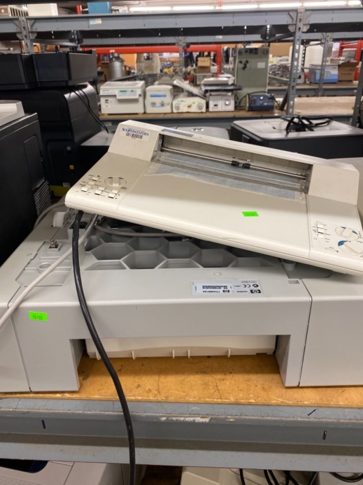 Large aisle (front and back) of printers and copiers for sale