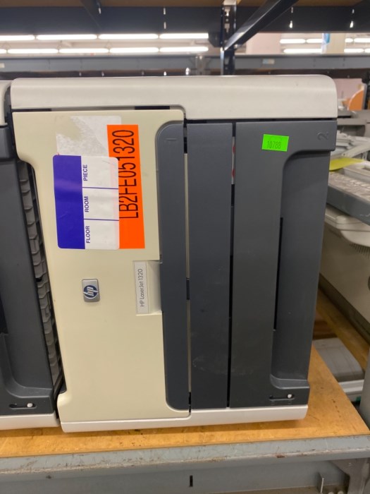 Large aisle (front and back) of printers and copiers for sale