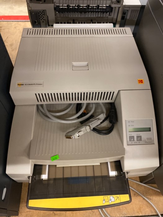 Large aisle (front and back) of printers and copiers for sale