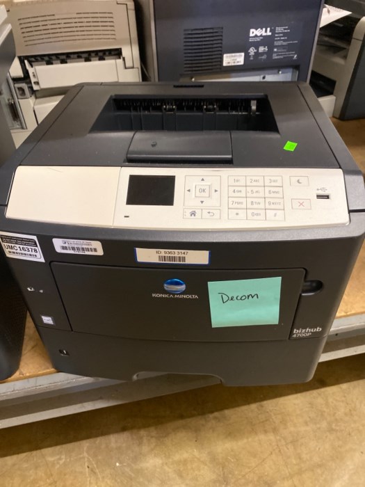 Large aisle (front and back) of printers and copiers for sale