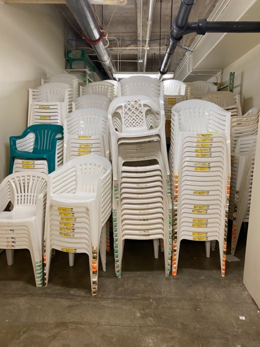 Lot of Approximately (400) Plastic Lawn Chairs for sale