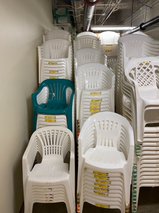 Lot of Approximately (400) Plastic Lawn Chairs for sale