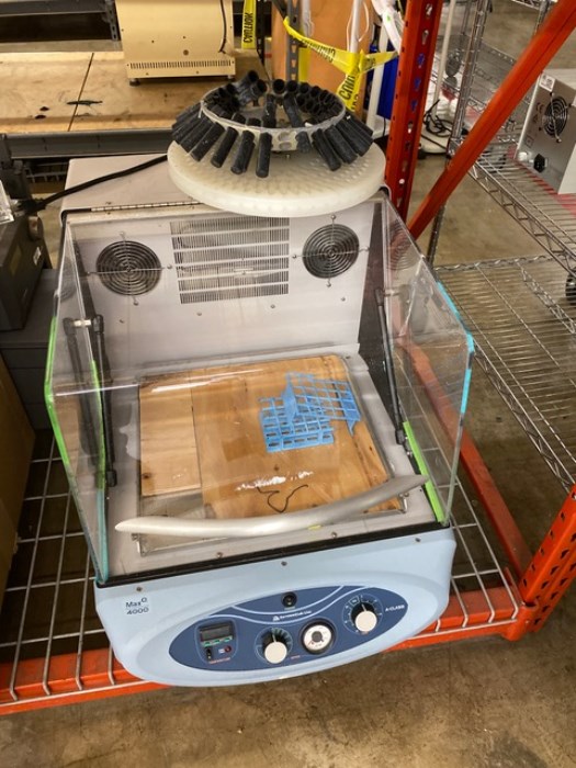 Multiple Shelves Filled with laboratory Equipment for sale