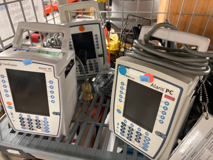 Shelf of medical equipment, Alaris PC 8015, GE Dash 4000, 3000 and more