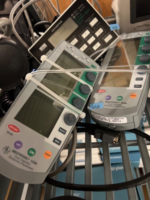 Shelf of medical equipment, Alaris PC 8015, GE Dash 4000, 3000 and more